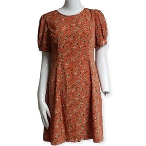 Peppermint burnt orange puff short sleeves feather dress size medium, NWOT